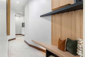 Corridor with recessed lighting, marble finish floor, visible vents, and baseboards