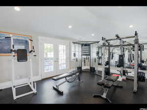 Exercise room with recessed lighting, french doors, and baseboards