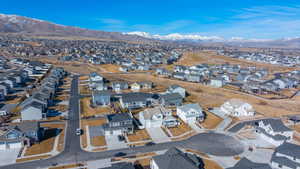 Drone / aerial view featuring a residential view and a mountain view