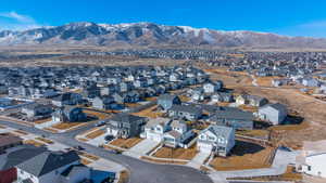 Drone / aerial view with a residential view and a mountain view