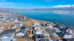 Drone / aerial view featuring a residential view and a water and mountain view