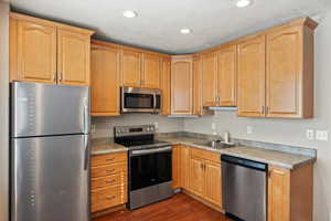 Basement kitchen with stainless steel appliances