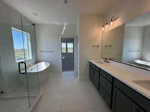 Bright and spacious Owners Bathroom.