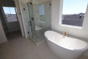 Modern Free-Standing Tub in Owners Bathroom.