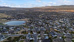 Bird's eye view with a residential view and a water and mountain view