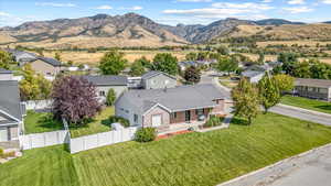 Drone / aerial view featuring a residential view and a mountain view