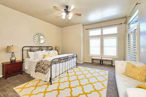 Primary Bedroom Suite with Doors to Covered Back Deck