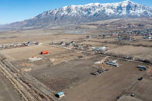 Birds eye view of property with a rural view and a mountain view