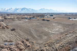 Drone / aerial view featuring a rural view and a mountain view