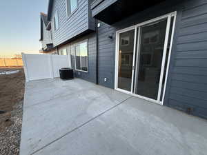 Patio terrace at dusk with fence