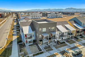 Drone / aerial view with a residential view and a mountain view