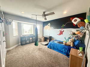 Carpeted bedroom featuring recessed lighting, visible vents, ceiling fan, a textured ceiling, and baseboards