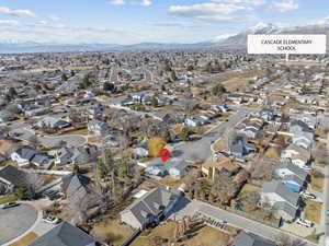 Drone / aerial view featuring a residential view and a mountain view