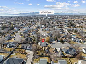 Drone / aerial view with a residential view and a mountain view