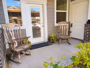 Property entrance with covered porch