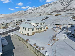 Property view of mountains with a residential view