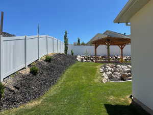 View of fenced backyard