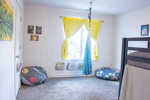 #2 Bedroom with carpet flooring