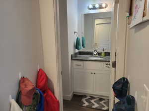 1/2 Bathroom with  granite vanity on main floor