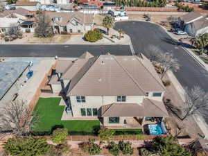 Birds eye view of property with a residential view