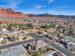 Birds eye view of property with a residential view and a mountain view