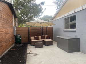 View of patio / terrace with fence and an outdoor hangout area