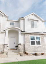 View of front of property with stone siding