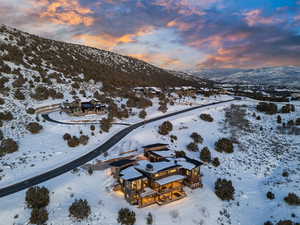 Snowy aerial view with a mountain view