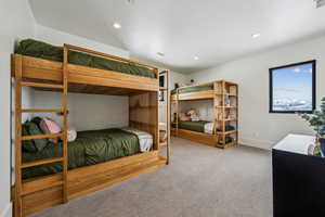 Carpeted bedroom featuring baseboards, visible vents, and recessed lighting