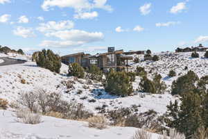 View of yard layered in snow