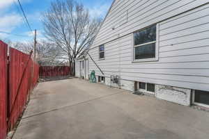 View of side patio / terrace featuring a fenced backyard