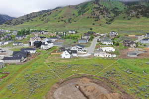 Birds eye view of property featuring a residential view, a rural view, and a mountain view