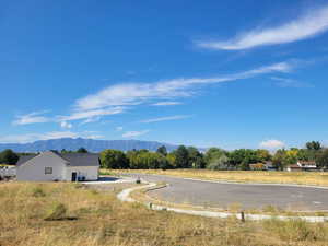 View of asphalt road with a mountain view