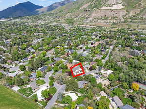 Drone / aerial view featuring a residential view and a mountain view