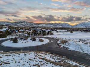 Property view of mountains with a residential view