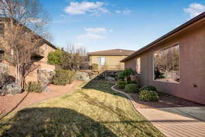 View of yard featuring fence