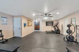 Exercise room with recessed lighting, ceiling fan, and baseboards