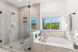 Full bathroom with a stall shower and a garden tub