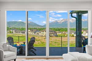 Entryway with a residential view and a mountain view