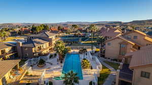 Birds eye view of property featuring a mountain view and a residential view