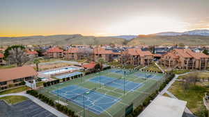 Aerial view at dusk with a residential view and a mountain view