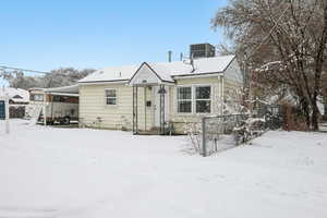 View of front of property featuring central AC unit