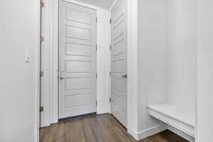 Interior space featuring wood finished floors and baseboards