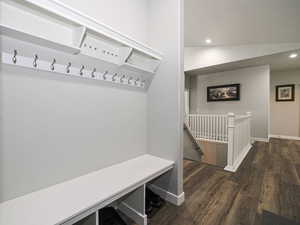 Mudroom featuring baseboards, dark wood-type flooring, and recessed lighting