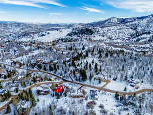 Snowy aerial view with a mountain view