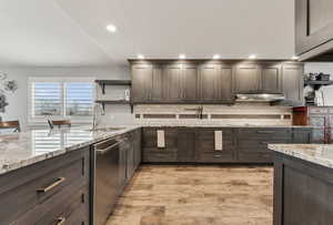 Brand new custom designed kitchen includes baker's appliance cupboards