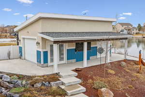 Oversized detached garage with French doors and pass thru door for entertaining