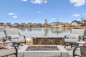 Gather around the Gas firepit overlooking the lake