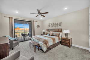 Bedroom featuring recessed lighting, light colored carpet, ceiling fan, access to outside, and baseboards