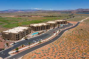 Birds eye view of property with a mountain view